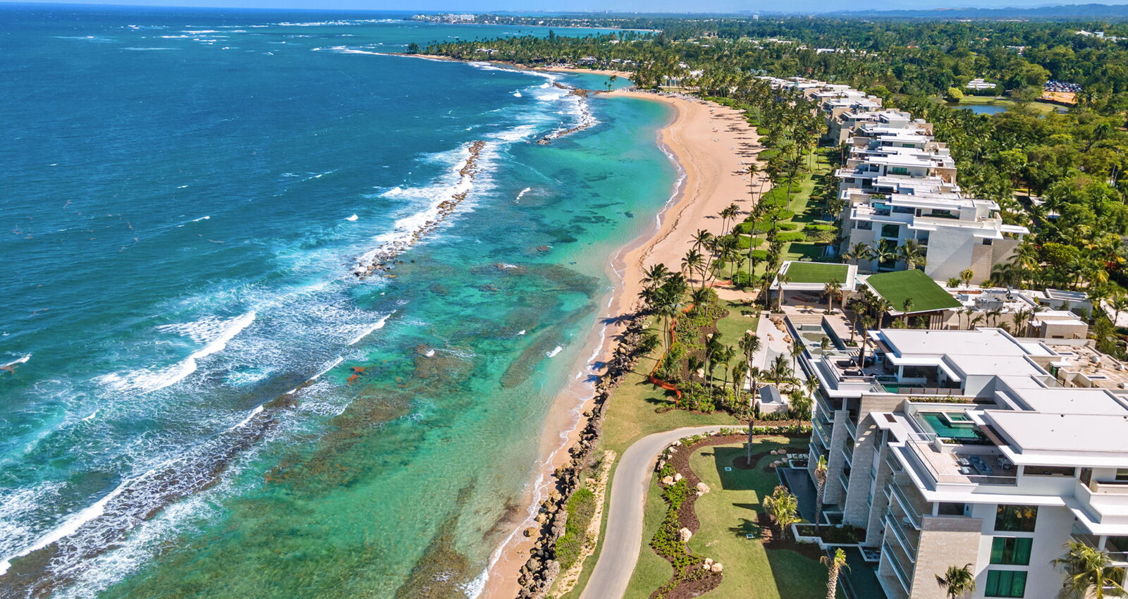 west point ritz-carlton reserve residence aerial view showcasing the oceanfront