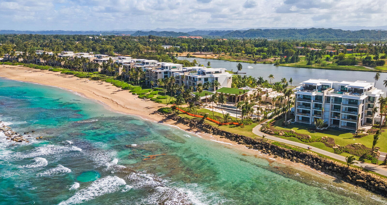 west point ritz-carlton reserve residence aerial view showcasing the ocean and waterfront views